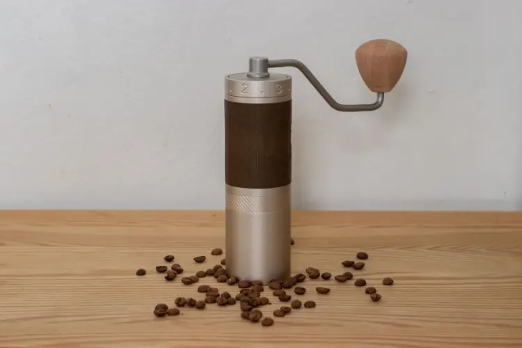 Manual coffee grinder and coffee beans